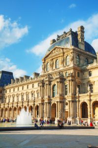 PARIS - OCTOBER 9: The Louvre museum on October 9, 2014 in Paris, France. The Louvre Museum is one of the world's largest museums and a historic monument and a central landmark of Paris.